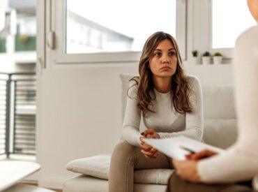 Client discussing feelings of living in survival mode during therapy session