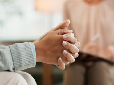 Young adult discussing identity shifts early adulthood during therapy session