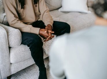 Client preparing questions to ask during a therapy consultation